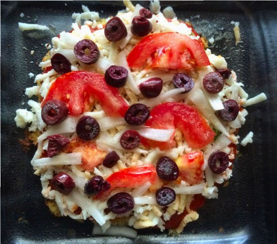 This last pizza was solely to use up my extra ingredients, and it actually came out the best, haha. Topped with vegan almond cheese, tomatoes, black olives and onions.