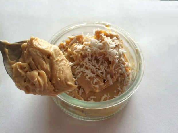 The coconut whipped cream should now resemble thick whipped cream, which is perfect for topping the warm dessert! 