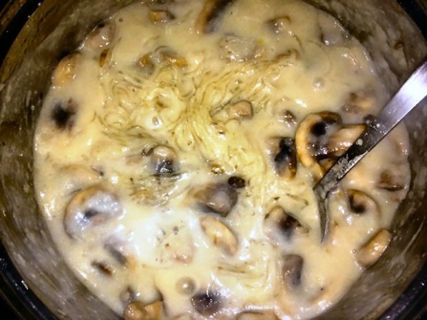 mung bean noodles cooking in the sauce